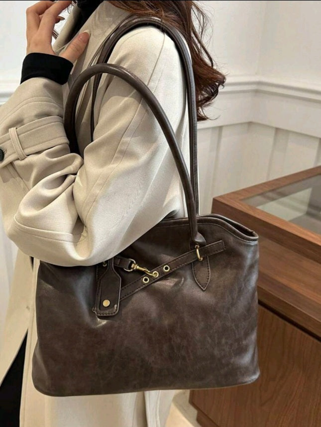 حقيبة نسائية من الجلد بلون بني