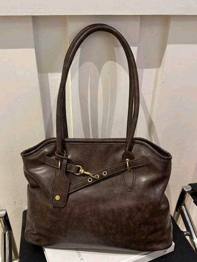 حقيبة نسائية من الجلد بلون بني