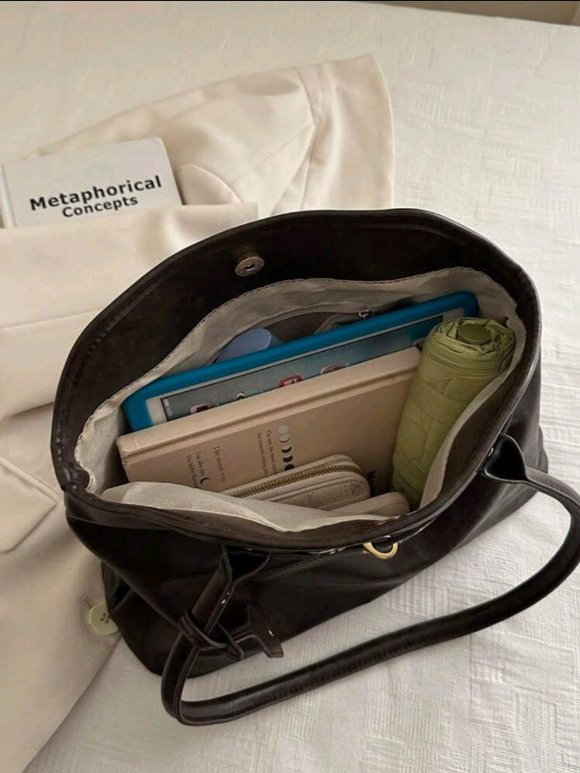 حقيبة نسائية من الجلد بلون بني