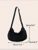Black shoulder bag with measurements on a beige background
