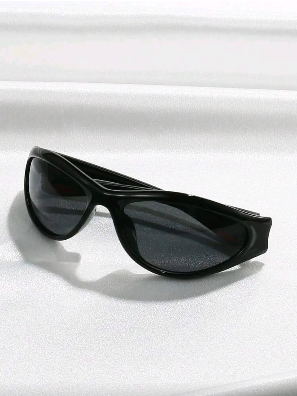 Black sunglasses on a white background