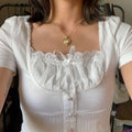 توب دانتيل ابيض نص ردن - Kyren Store top